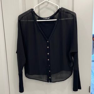 Black sheer buttoned top.